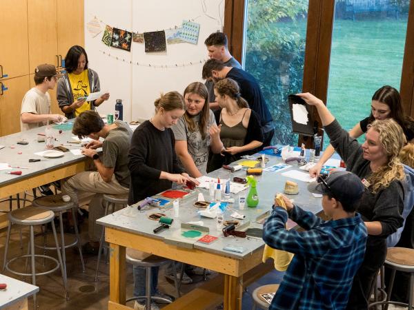 several teens making art in the Hailey classroom